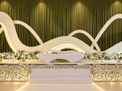 كوشة زفاف بتصميم موجي أبيض وخلفية زيتونية